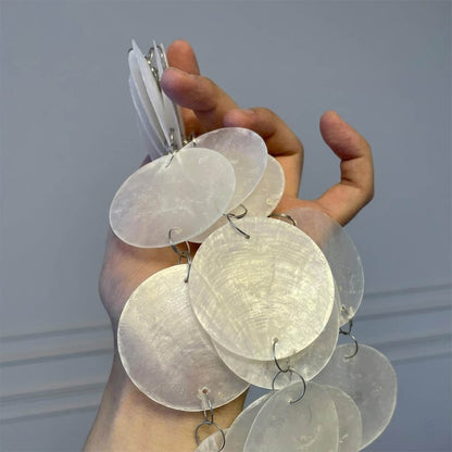 Sirena Capiz shell disc translucent natural pearl iridescent close up detail Coastal Mid Century authentic craftsmanship