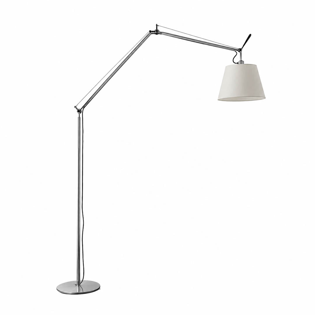 Snodo floor lamp in the 65.7-inch height, metal swing arm with fabric shade beside a reading chair