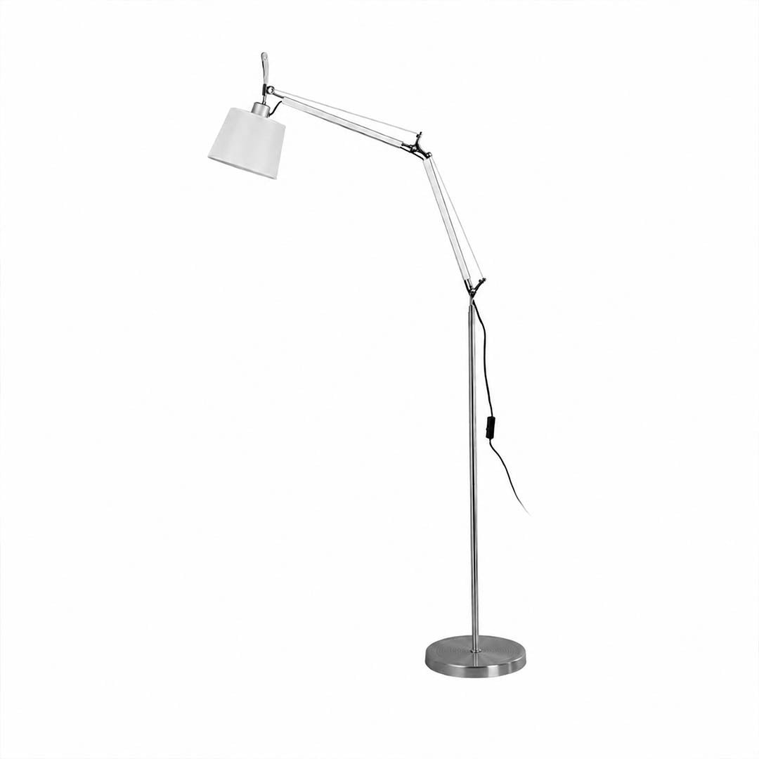 Snodo floor lamp in the 65.7-inch height, metal swing arm with fabric shade beside a reading chair