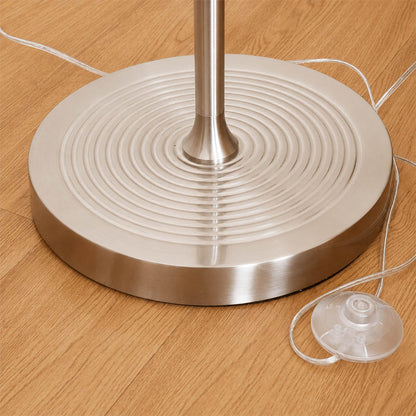 Snodo floor lamp weighted round base shown flat on a hardwood floor