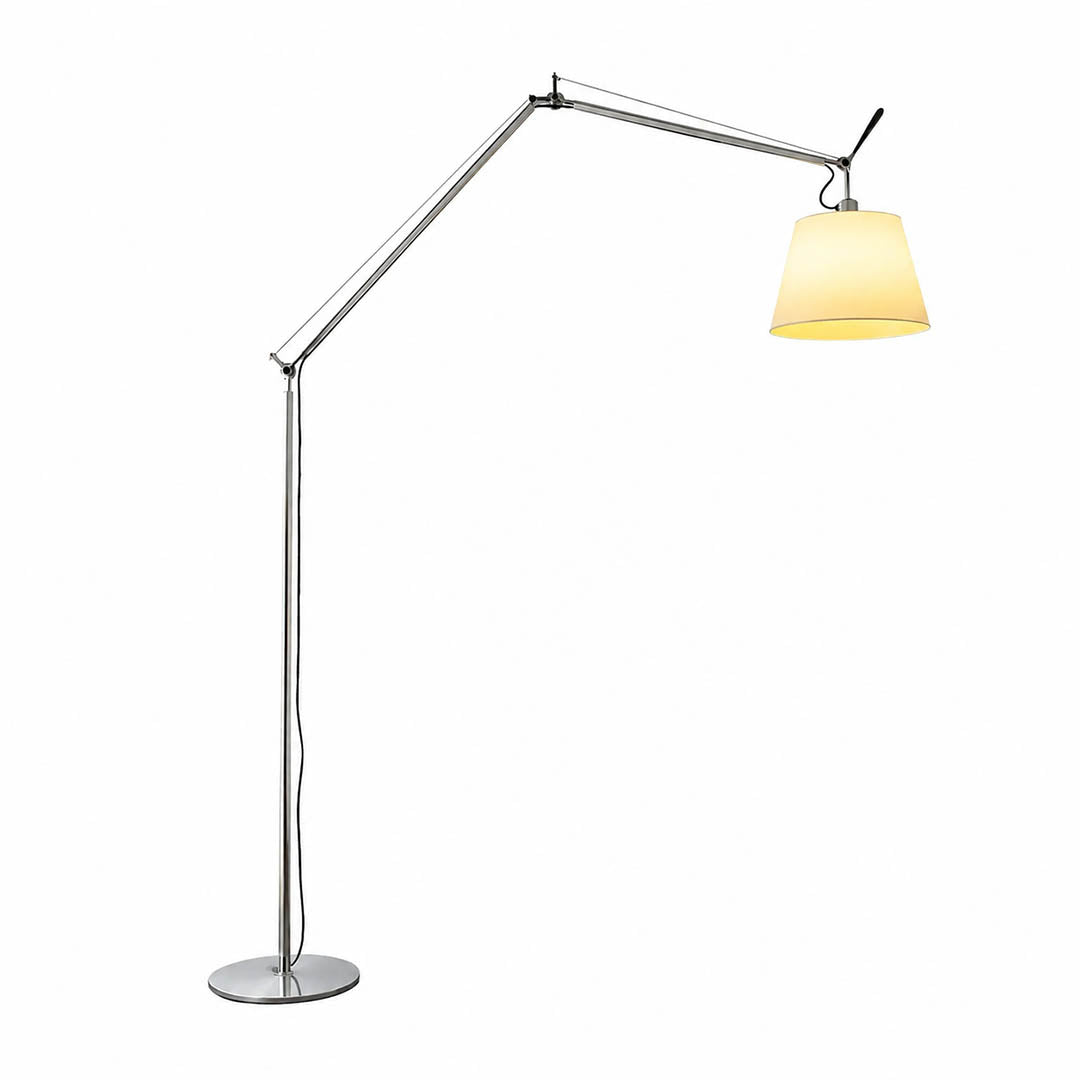 Snodo floor lamp in the 65.7-inch height, metal swing arm with fabric shade beside a reading chair