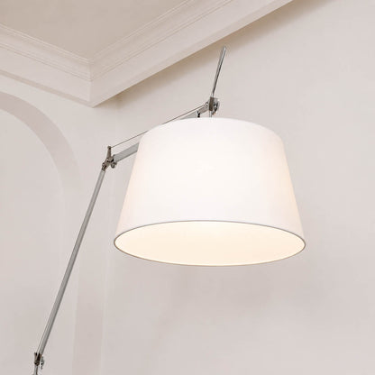 Detail of the Snodo floor lamp tapered fabric drum shade and its warm downward glow