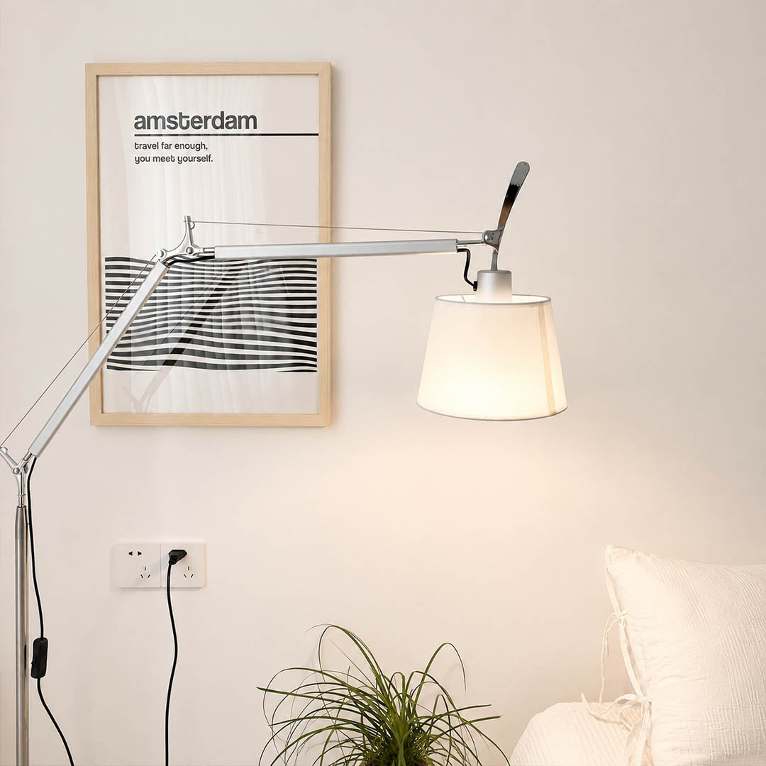 Detail of the Snodo floor lamp tapered fabric drum shade and its warm downward glow