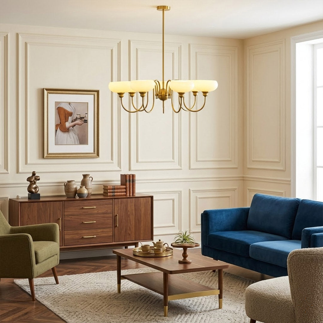 Solari cream glass chandelier above dining table warm amber gold light organic modern interior