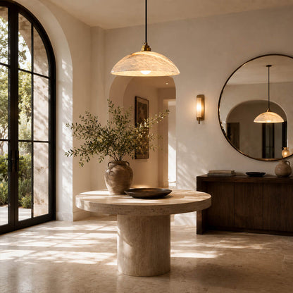 Sole alabaster pendant light entryway foyer natural stone dome gold warm welcoming modern American home lifestyle interior styled