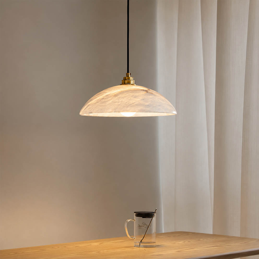 Sole alabaster pendant light natural stone organic veining unique pattern detail close up translucent craftsmanship