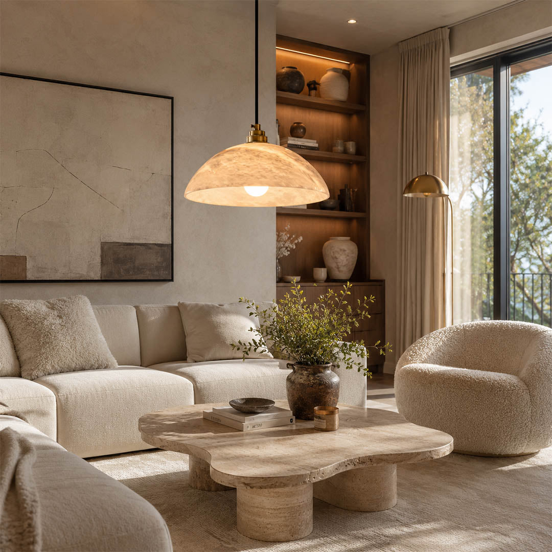 Sole alabaster pendant light living room natural stone dome gold statement quiet luxury warm American home lifestyle interior styled