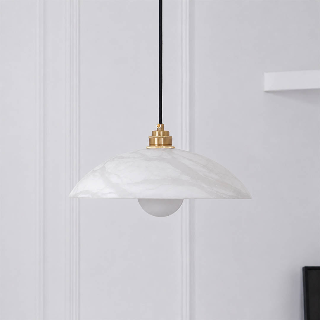 Sole alabaster pendant light natural stone organic veining unique pattern detail close up translucent craftsmanship