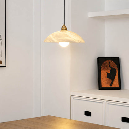 Sole alabaster pendant light illuminated glowing veining warm soft radiance translucent stone detail close up quiet luxury