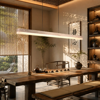 Sole travertine pendant light conference reception oversized warm glow travertine stone disc commercial interior styled