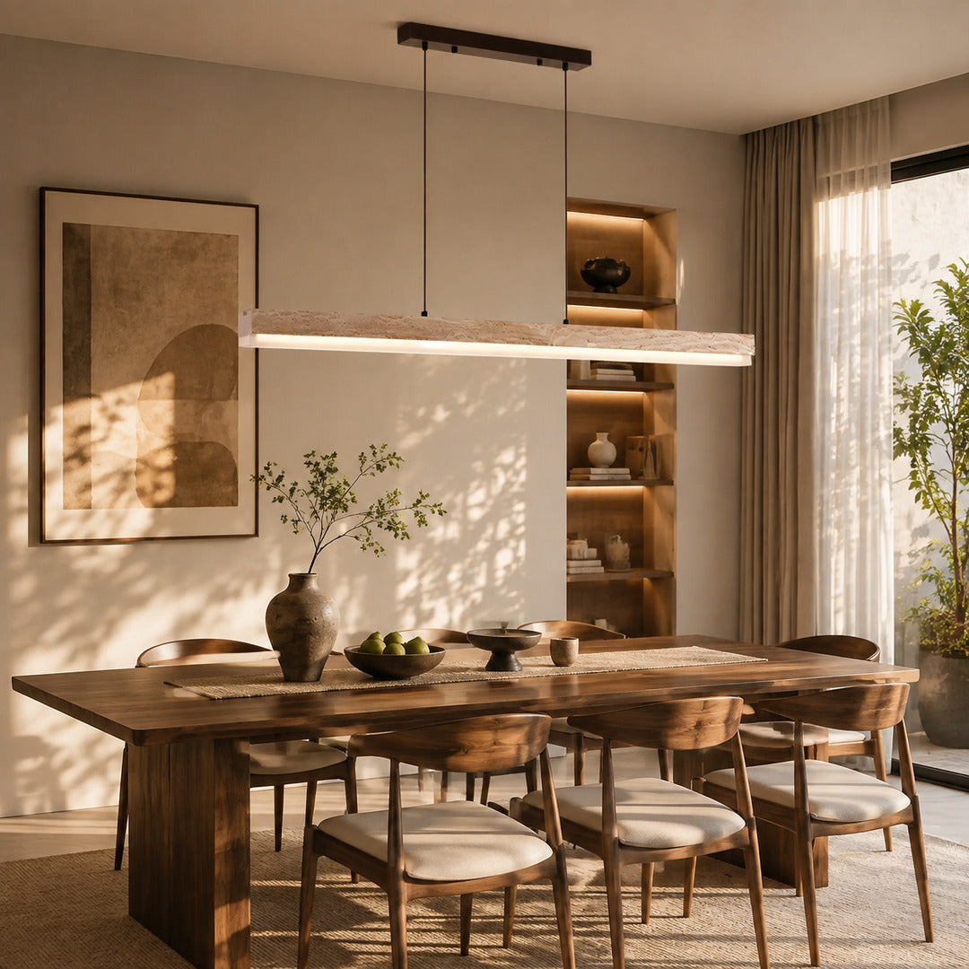 Sole travertine pendant light open plan living dining oversized warm glow travertine stone disc American home lifestyle interior styled