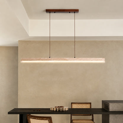 Sole travertine pendant light large dining table oversized warm glow natural travertine stone disc statement American home lifestyle interior styled