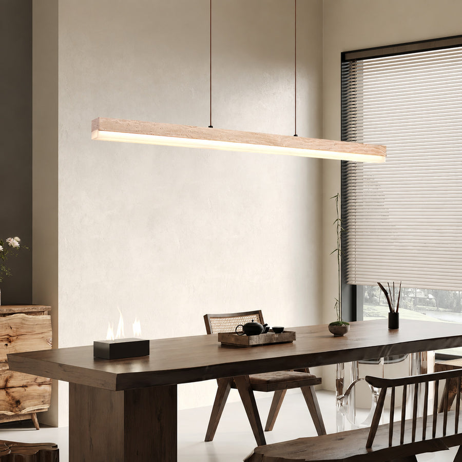 Sole travertine pendant light large dining table oversized warm glow natural travertine stone disc statement American home lifestyle interior styled