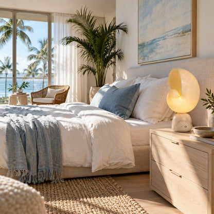 Pair of Spira alabaster shell lamps on nightstands either side of a bed