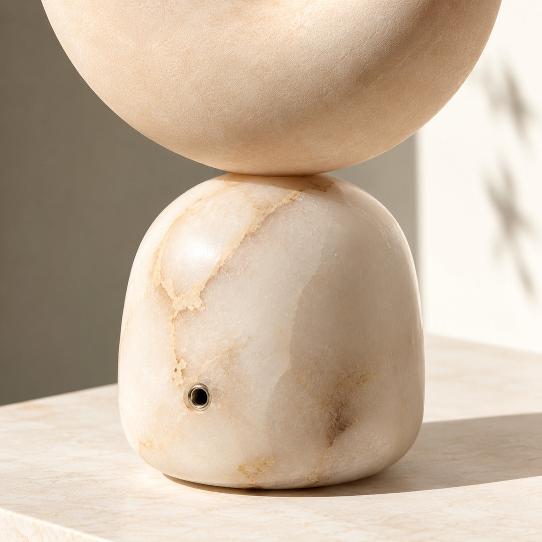 Close-up of natural veining on the carved alabaster spiral of the Spira table lamp
