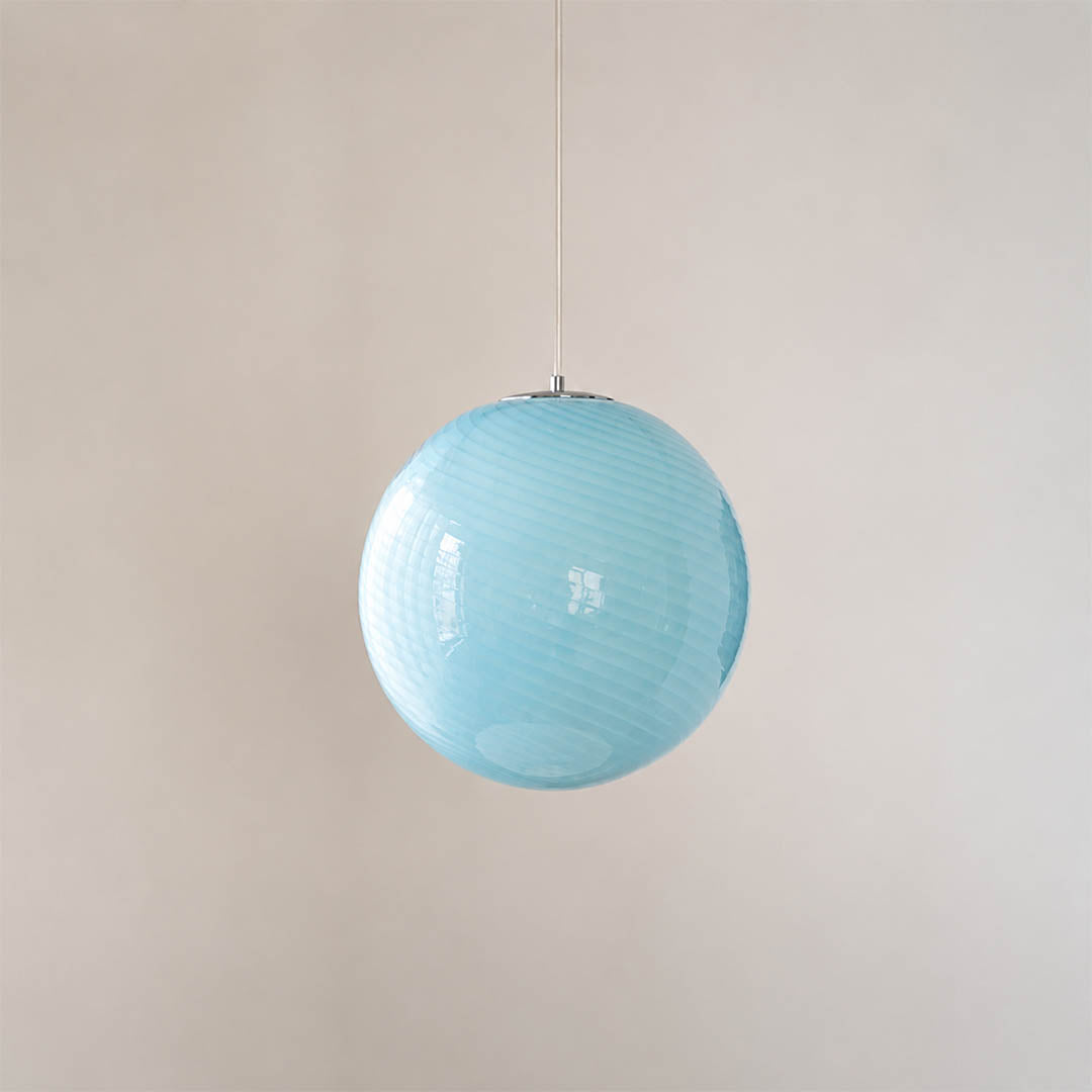 Spira pendant light signature spiral ribbed hand blown glass texture swirled surface detail close up craftsmanship authentic Italian tradition inspired