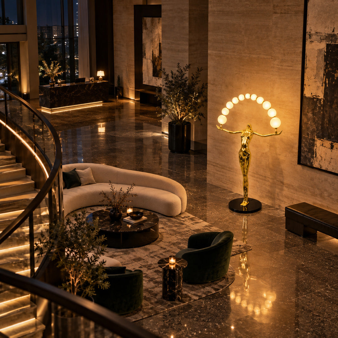 Statue of Liberty floor lamp as a dramatic sculptural focal point in a luxury hotel lobby