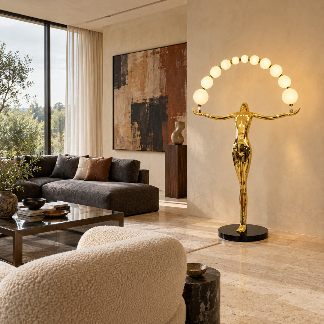 Statue of Liberty floor lamp filling a tall living room corner with an arc of warm glowing orbs