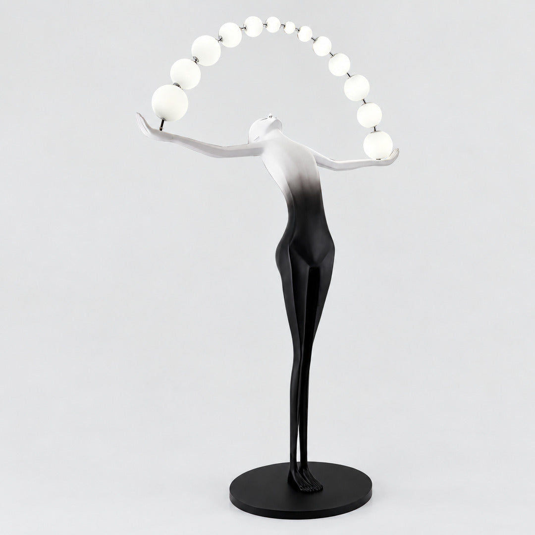 Black and white Statue of Liberty floor lamp as a dramatic sculptural statement in a living room