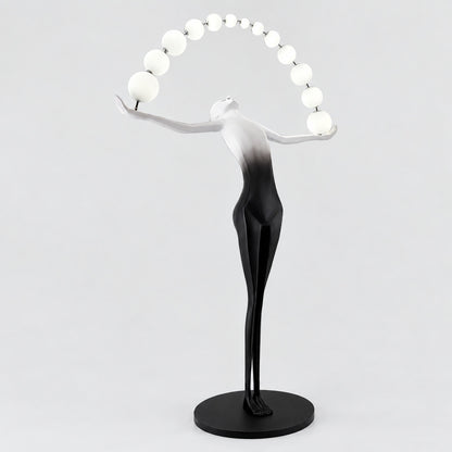 Black and white Statue of Liberty floor lamp as a dramatic sculptural statement in a living room