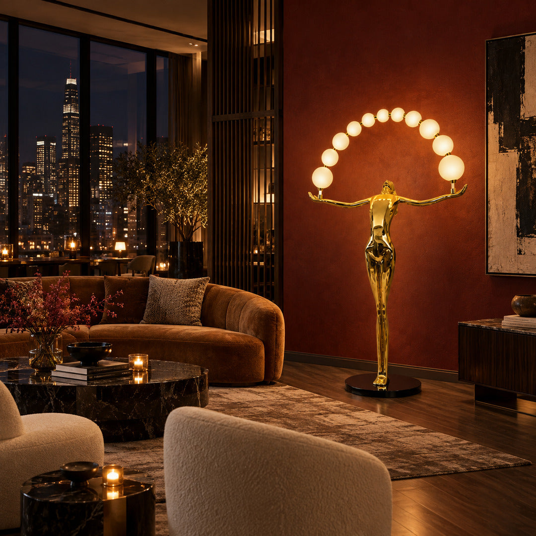 Statue of Liberty floor lamp as a dramatic sculptural focal point in a luxury hotel lobby
