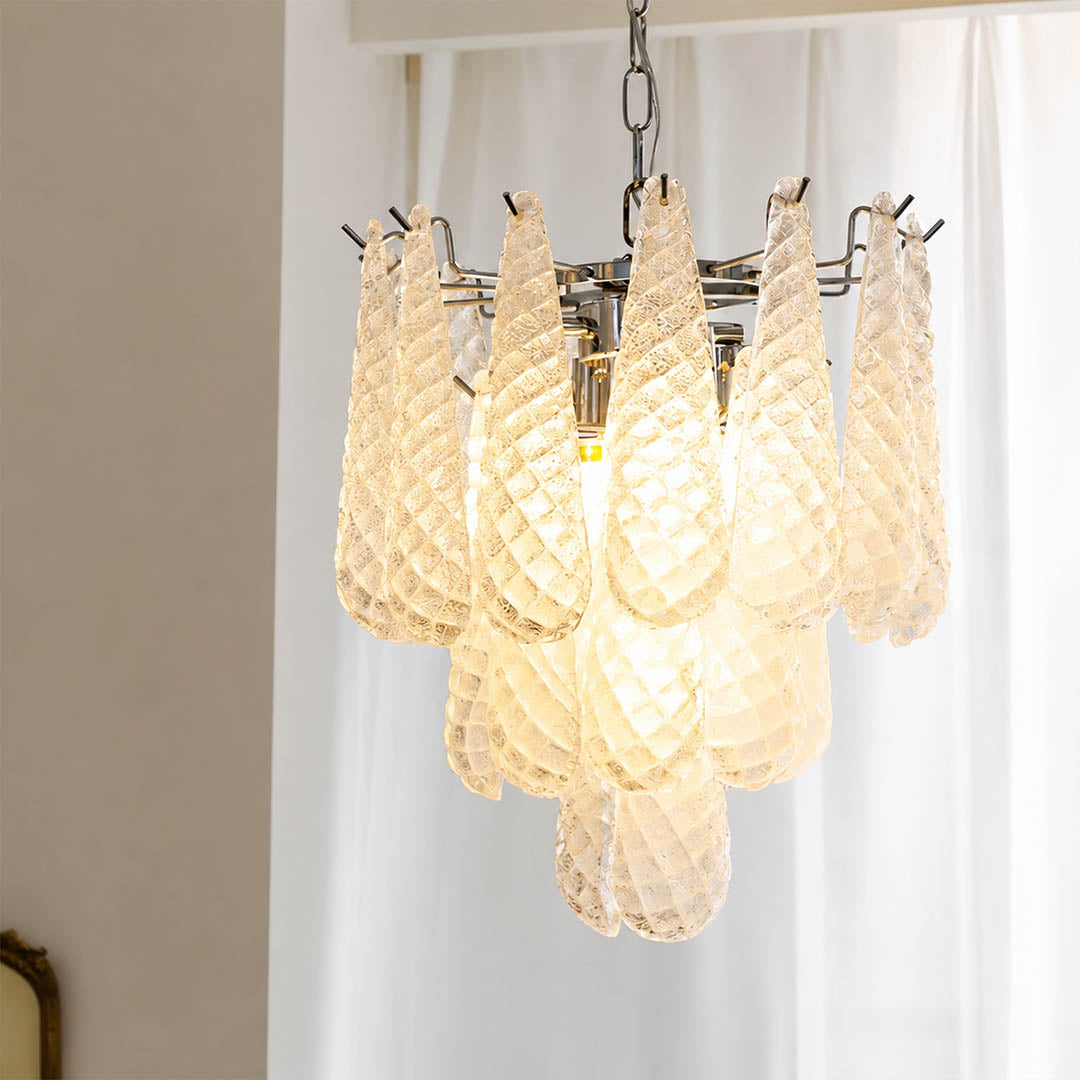 Stella Murano glass teardrop chandelier polished gold frame living room art deco Hollywood Regency Italian luxury warm glow lifestyle interior
