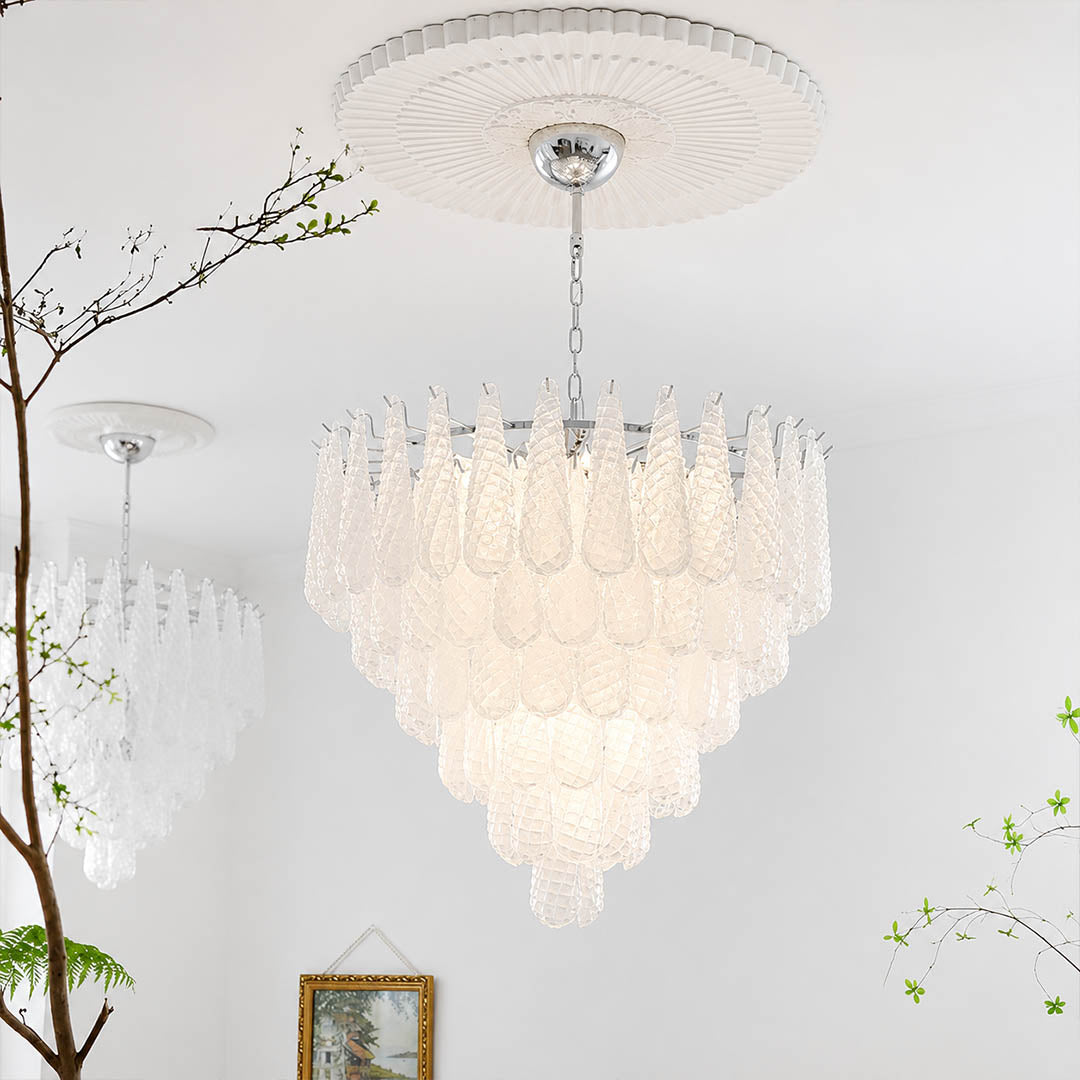 Stella Murano glass teardrop chandelier polished gold frame living room art deco Hollywood Regency Italian luxury warm glow lifestyle interior