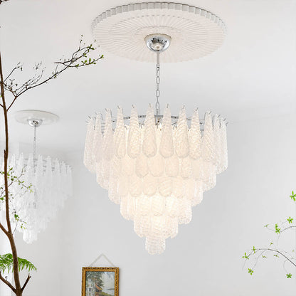 Stella Murano glass teardrop chandelier polished gold frame living room art deco Hollywood Regency Italian luxury warm glow lifestyle interior