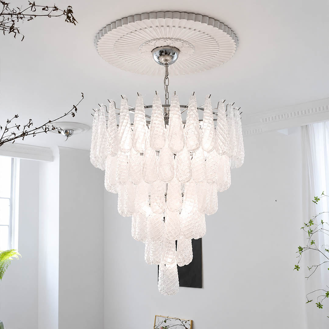 Stella Murano glass teardrop chandelier polished gold frame living room art deco Hollywood Regency Italian luxury warm glow lifestyle interior