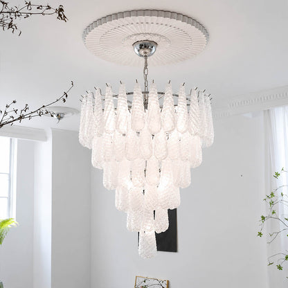 Stella Murano glass teardrop chandelier polished gold frame living room art deco Hollywood Regency Italian luxury warm glow lifestyle interior