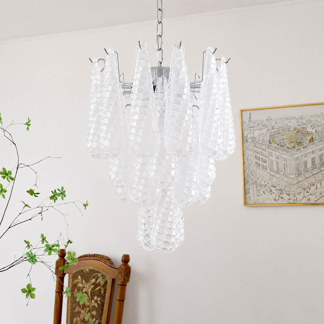 Stella Murano glass teardrop chandelier polished gold frame living room art deco Hollywood Regency Italian luxury warm glow lifestyle interior