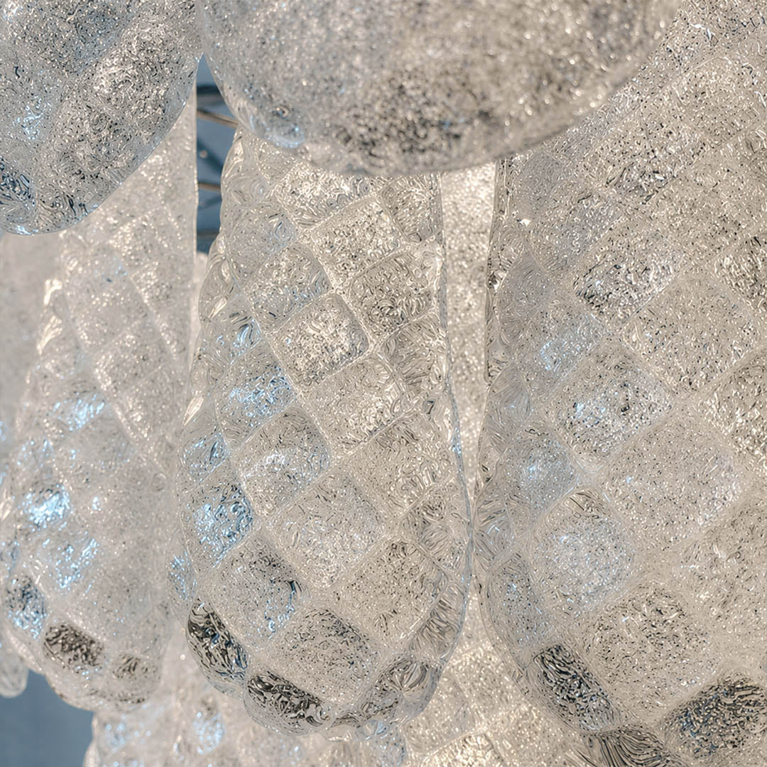 Stella Murano hand blown glass teardrop translucent clarity Italian craftsmanship detail close up authentic premium quality