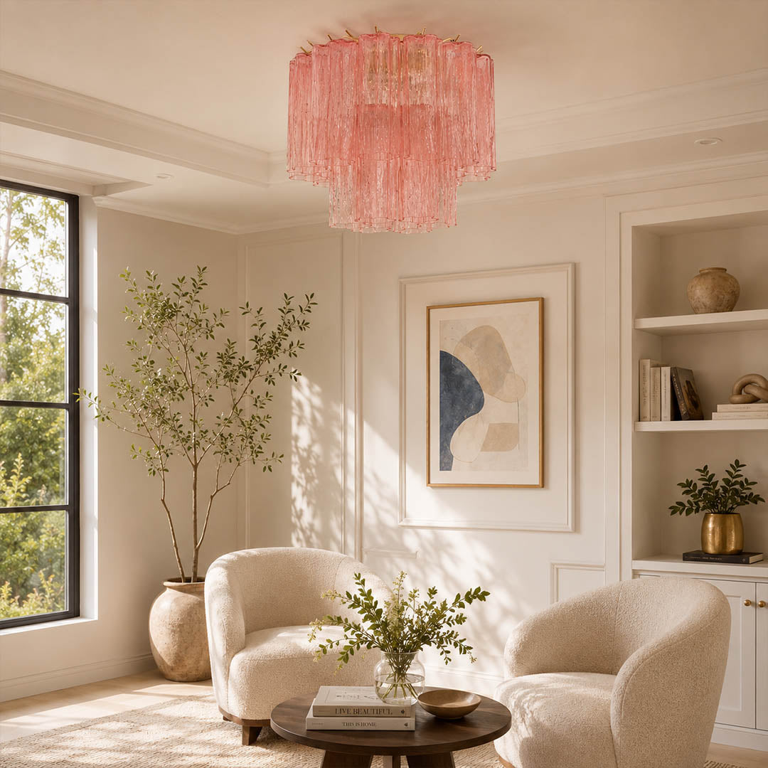 Modern American living room with the exact smoky-gray Stellina ceiling light. Pale stone, dark wood, ivory sofa, natural daylight, and subtle warm glow.