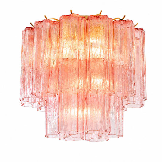 Pure white background, exact Stellina ceiling light with translucent dusty-pink glass and polished gold frame. Light off, centered three-quarter view, realistic material texture, no props or text.
