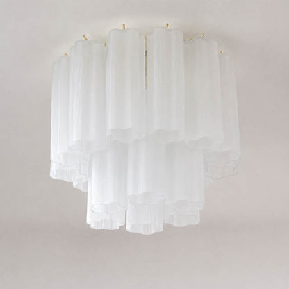 Pure white background, exact Stellina ceiling light with translucent white star-shaped glass tubes and polished gold frame. Light off, centered three-quarter view, realistic glass reflections, no props or text.