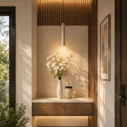 Stelo travertine pendant light entryway foyer warm glow travertine stone slim minimalist American home lifestyle interior styled