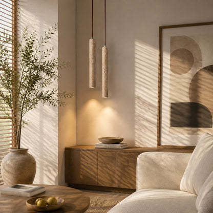 Stelo travertine pendant light living room warm glow travertine stone slim sculptural American home lifestyle interior styled