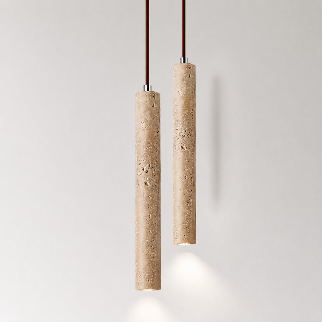 Stelo travertine pendant light slim tall cylinder elongated silhouette architectural shape detail