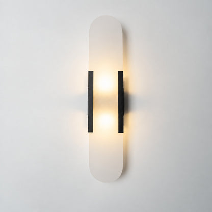 Tall 19.7-inch black Stilo alabaster wall sconce as a bold vertical accent in a living room