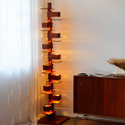 Strato floor lamp walnut wood modern dining room sideboard adjacent architectural statement art deco layered Prairie School inspired warm ambient glow evening entertaining sophisticated lifestyle interior American home