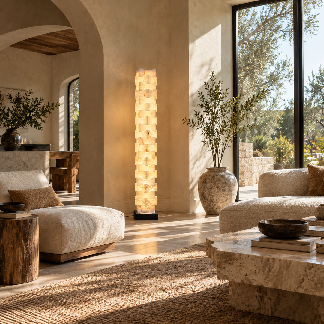 Slim Strato alabaster floor lamp tucked into a living room corner