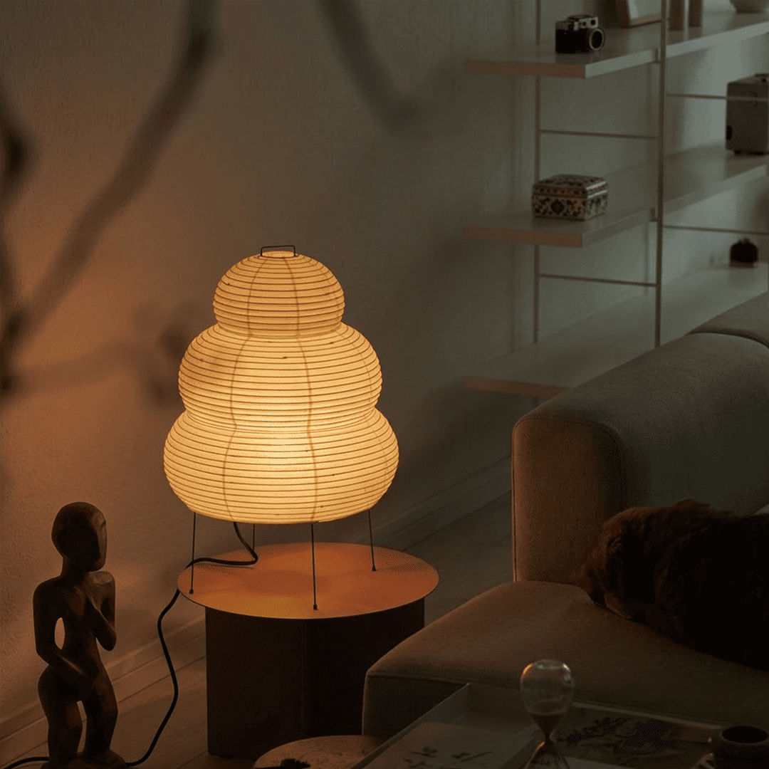 Stuberlighting 25N large Washi paper floor lamp with three-tiered silhouette in a warm minimalist living room setting.