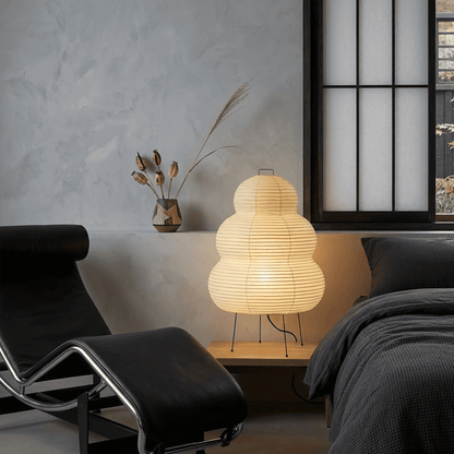 Stuberlighting 25N large Washi paper floor lamp with three-tiered silhouette in a warm minimalist living room setting.