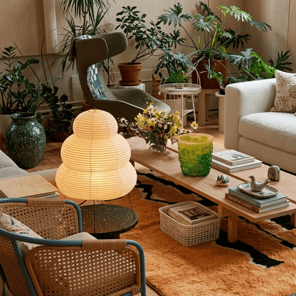 Stuberlighting 25N large Washi paper floor lamp with three-tiered silhouette in a warm minimalist living room setting.