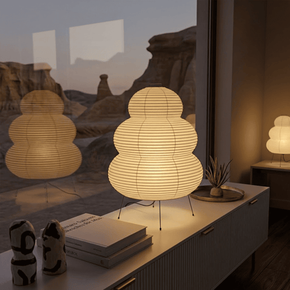 Stuberlighting 25N large Washi paper floor lamp with three-tiered silhouette in a warm minimalist living room setting.