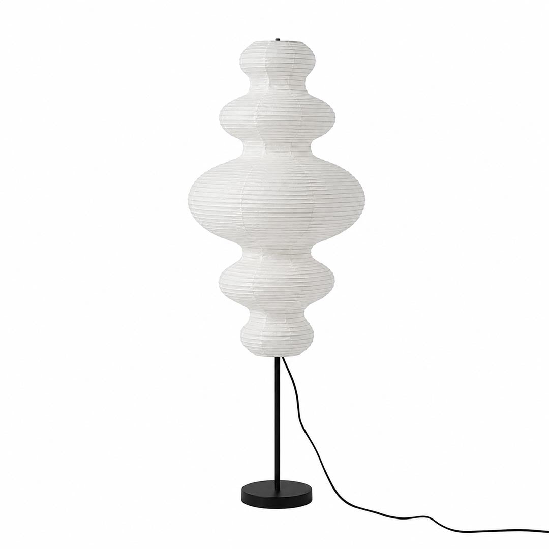 Handcrafted Chigiri Washi paper tower floor lamp with hand-torn mulberry paper texture and matte black base.