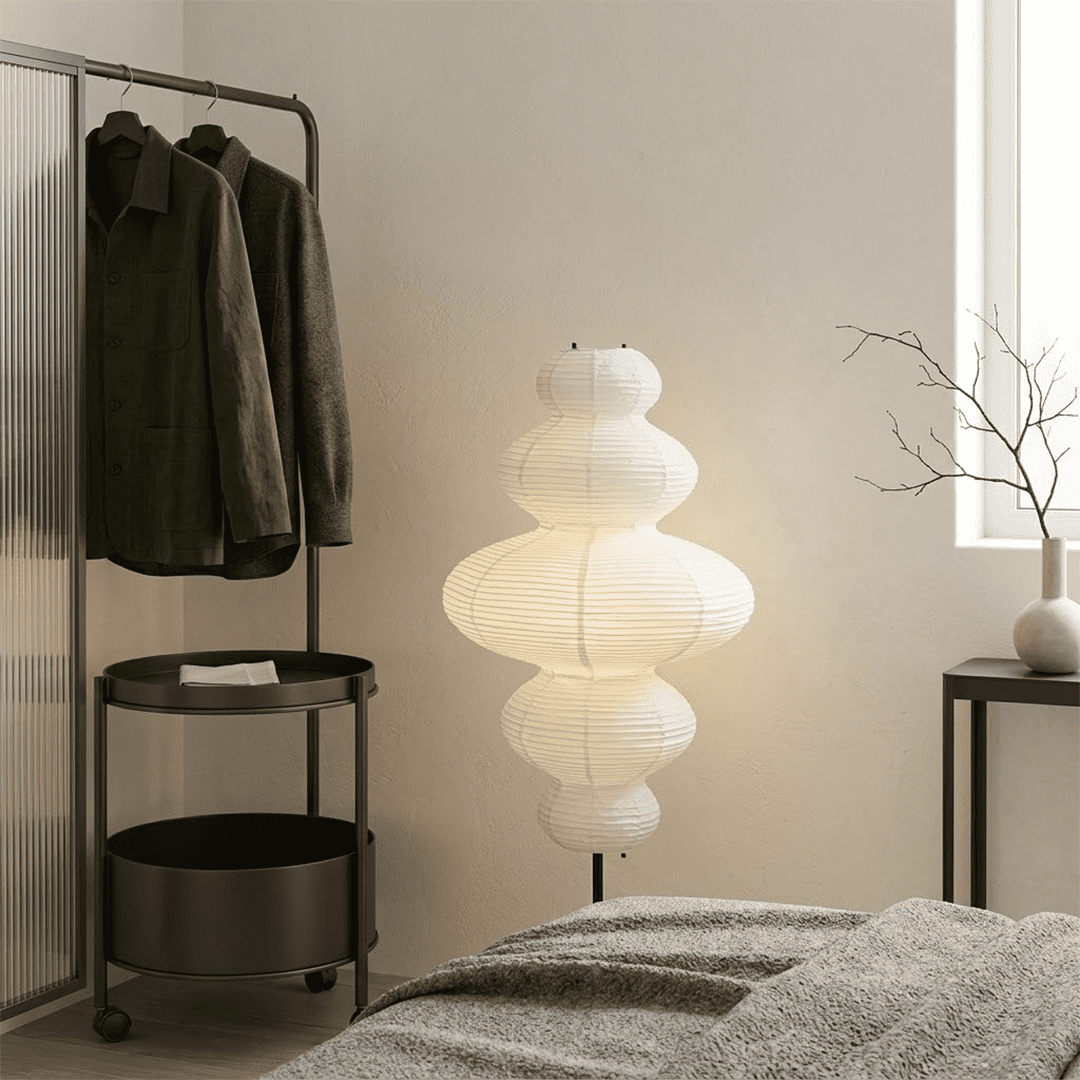 Handcrafted Chigiri Washi paper tower floor lamp with hand-torn mulberry paper texture and matte black base.