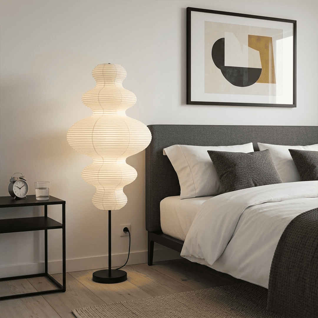 Handcrafted Chigiri Washi paper tower floor lamp with hand-torn mulberry paper texture and matte black base.