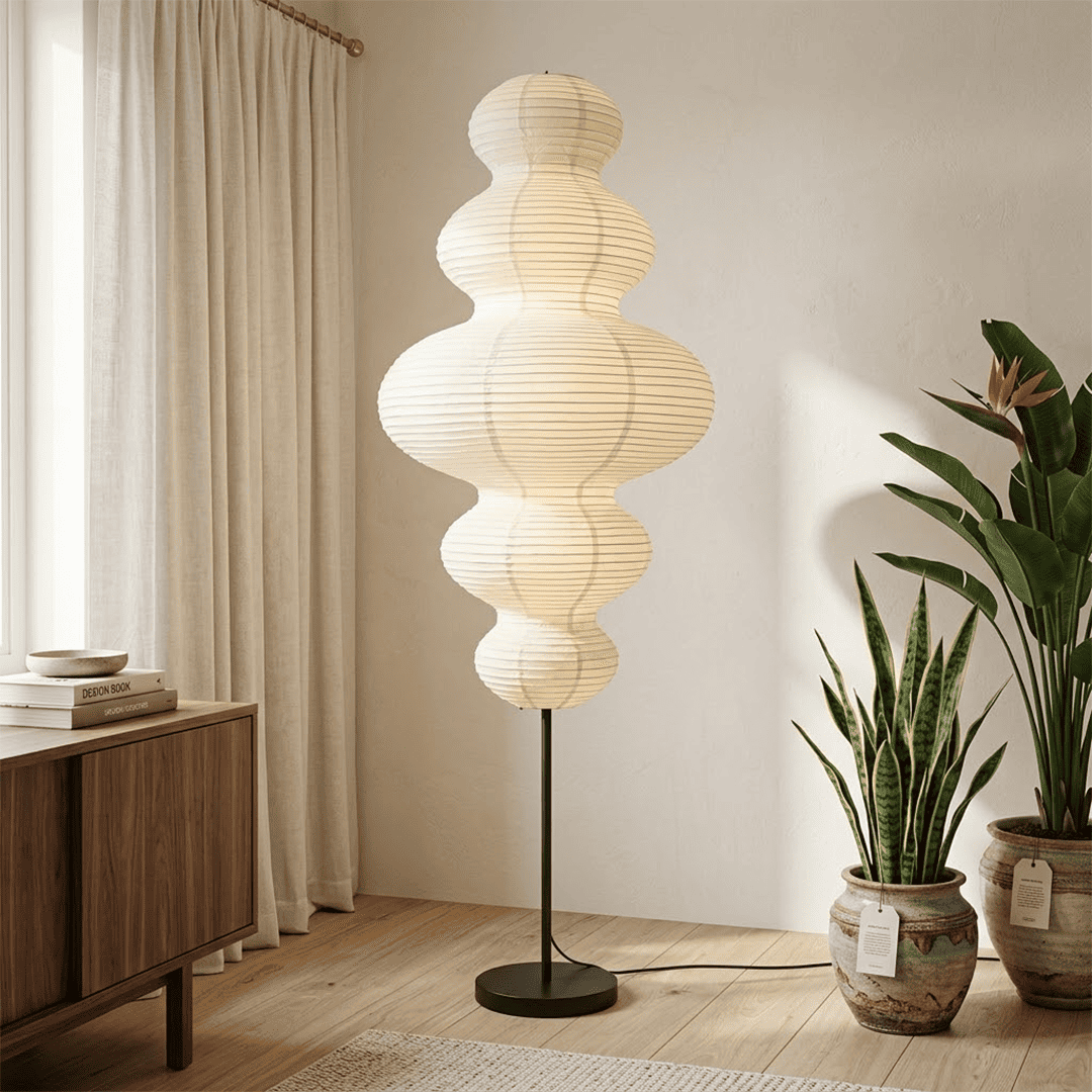 Handcrafted Chigiri Washi paper tower floor lamp with hand-torn mulberry paper texture and matte black base.