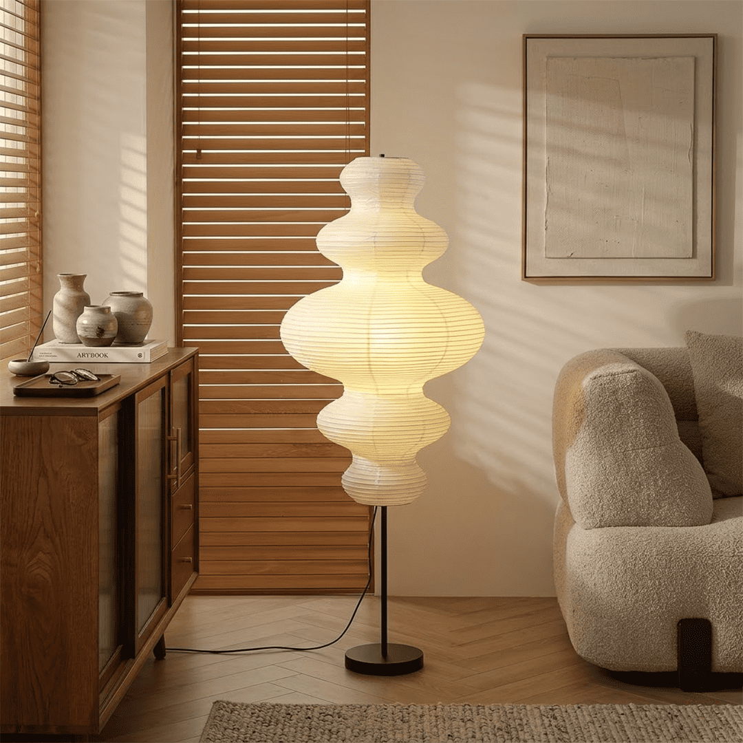 Handcrafted Chigiri Washi paper tower floor lamp with hand-torn mulberry paper texture and matte black base.